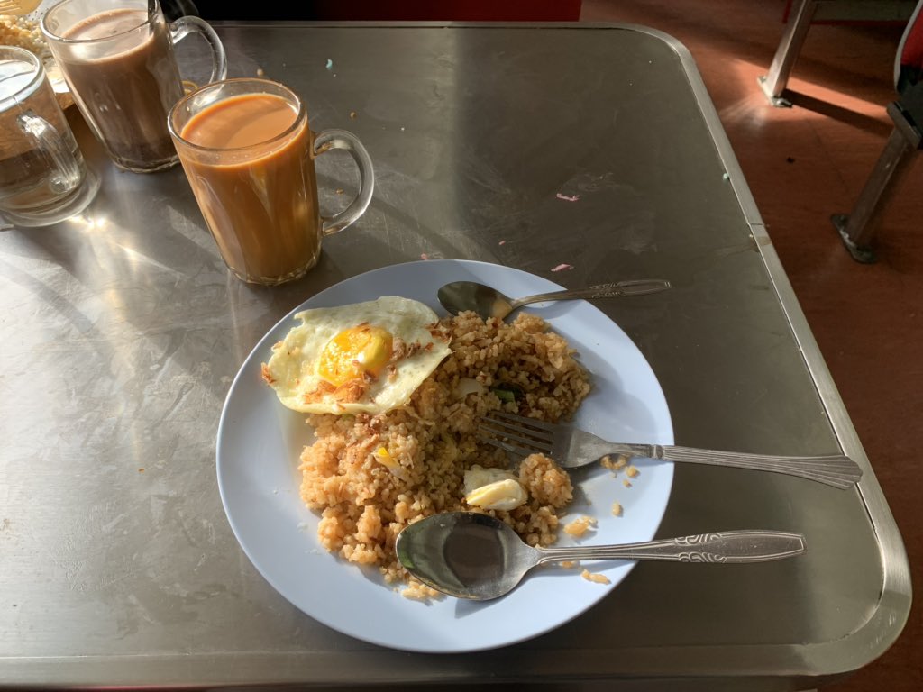 Now time for breakfast at  #DiningCar ( @_DiningCar) of Ekspres Rakyat Timuran. It was packed with people when I arrived. Food came quickly after the order - Nasi Goreng with two eggs and tea. Without rice, it is difficult to survive the heat in tropics. It gives instant energy.