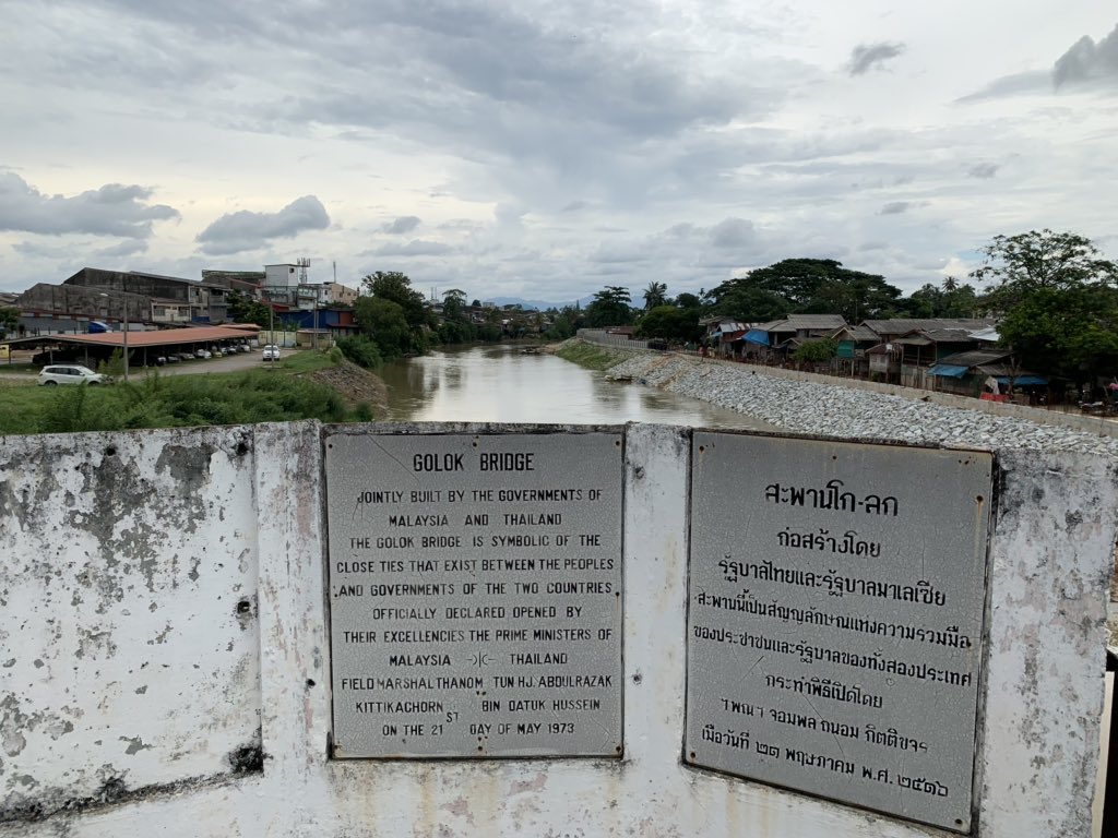 On River Kolok that forms the international boundary between Malaysia and Thailand. Notice the boats parked on either side which people use to fish and go across. For people along the river there is no “immigration”.