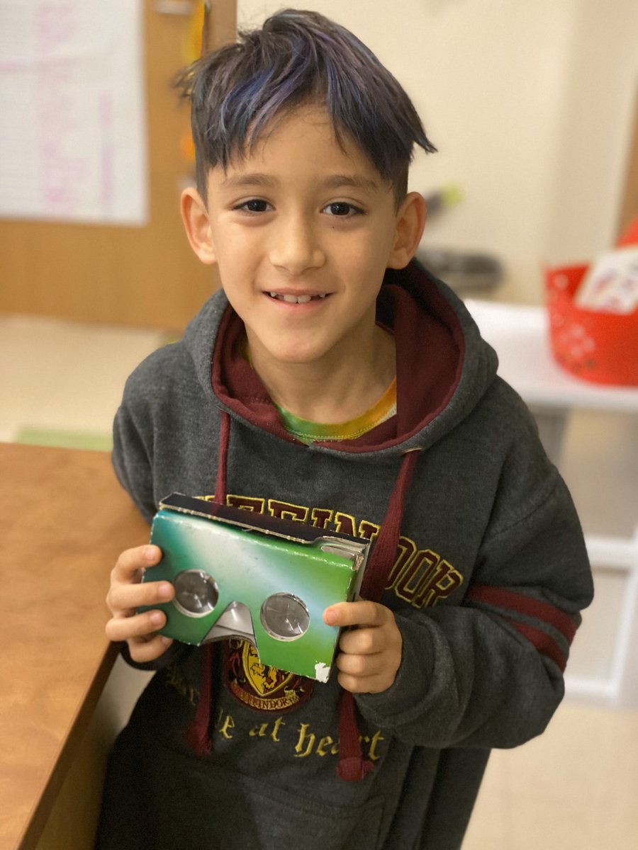 Congratulations to all the State Fair candy apple Math Night door prize winners. Kieran accepting the Top Prize...Google Cardboard for his mom