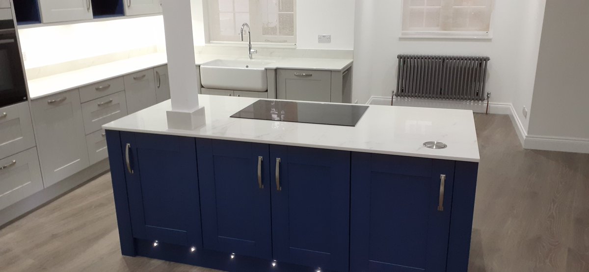 Tyrolean Blue Island with Pale Grey in this Mereway Lincoln kitchen with Dekton Tundra worktops from Cosentino by Stortford kitchens
