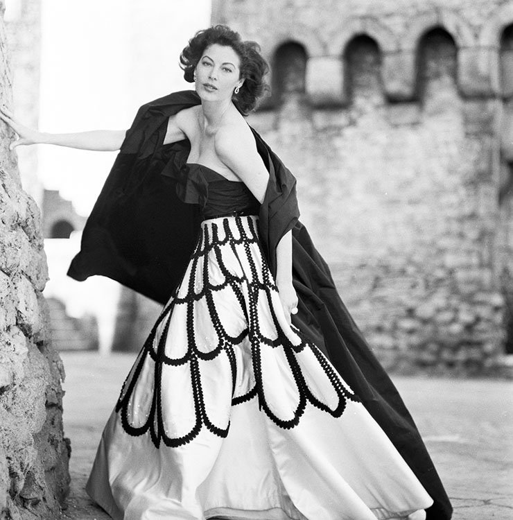 American actress and singer #AvaGardner photographed in Spain whilst filming her role as Queen Guinevere in the 1953 film Knights of the Round Table. British Vogue, December 1953.