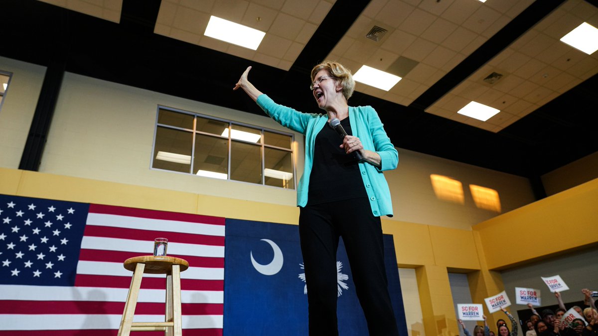 Elizabeth Warren waves to crowd of supporters at Goose Creek town hall.