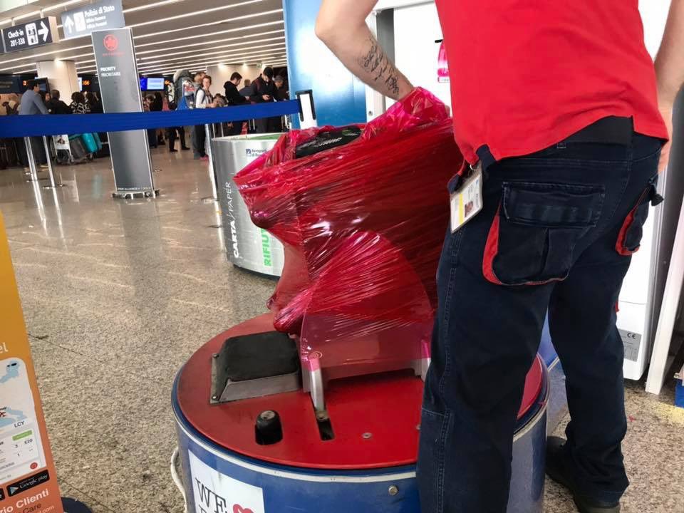 AlisonTaylorBro's tweet photo. I was worried about my suitcase of books because it was not really a suitcase but a rolling bag for craft supplies that I got at Hobby Lobby. Then I discovered that you can have your bag shrink wrapped. Hopefully my Boccaccio biographies won’t be circling on the conveyor belt. https://t.co/YYiRY1XZIo