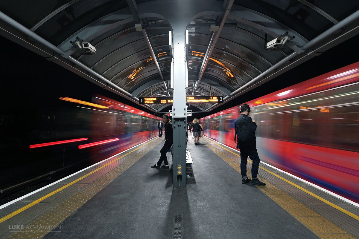 OPPOSITE DIRECTIONS PHOTO /4SHADWELLThe train comes and goes from the Docklands Light Railway station at night.  http://instagram.com/tubemapper&nbsp;  http://shop.tubemapper.com/Shadwell-Station/Photography thread capturing trains leaving & arriving a London Underground station.THREAD