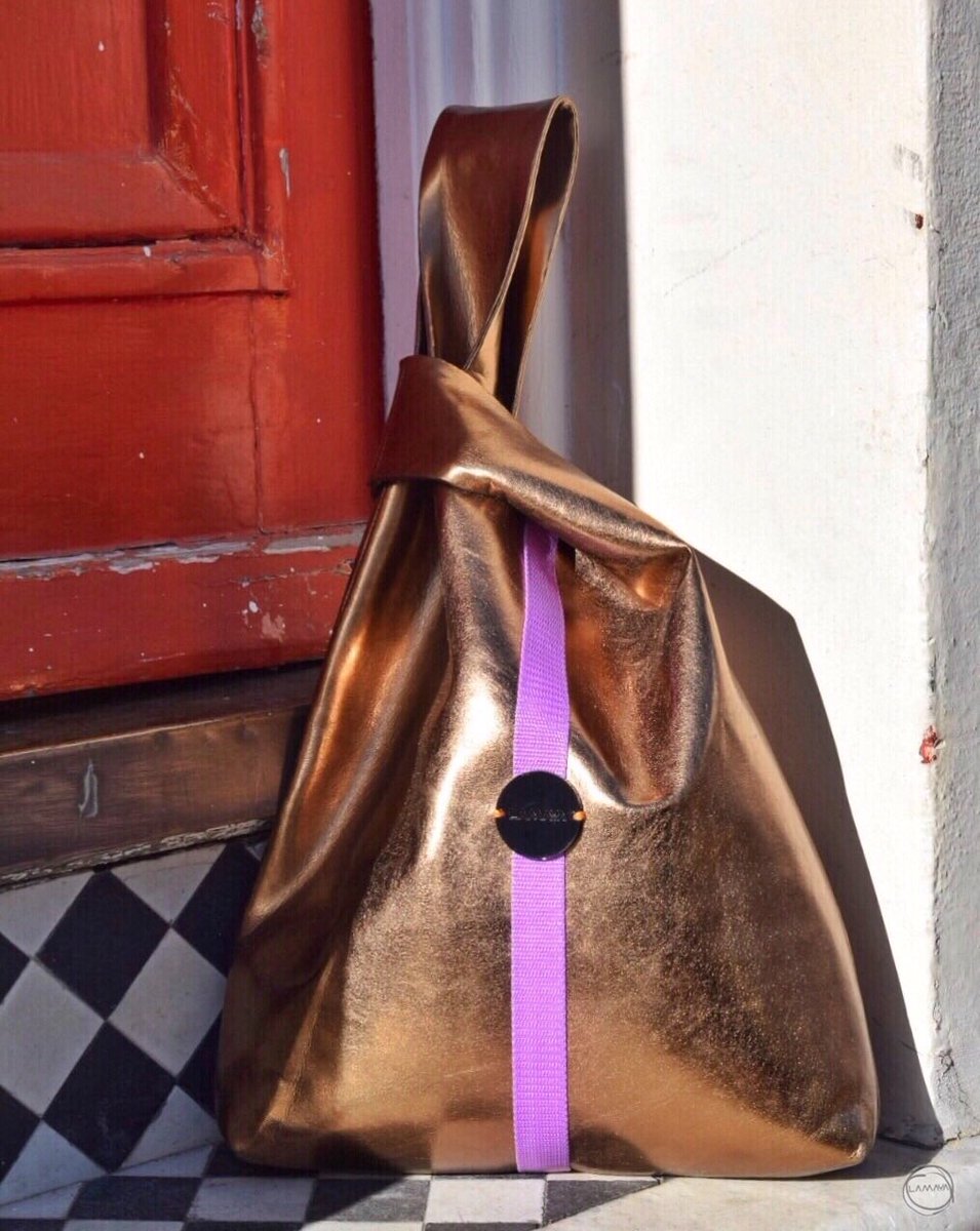 Knot bag. The perfect companion for any outfit. #shoppinginbrighton #handcraftedbag #teenfashions #womansaccessories #stylealerts #newbagswag #bagoftheday👜 #japaneseknotbag #fauxleatherbags #lamayastore #beeudesignstudio #brightonshopping #visitourshop #designminimal #fabgift