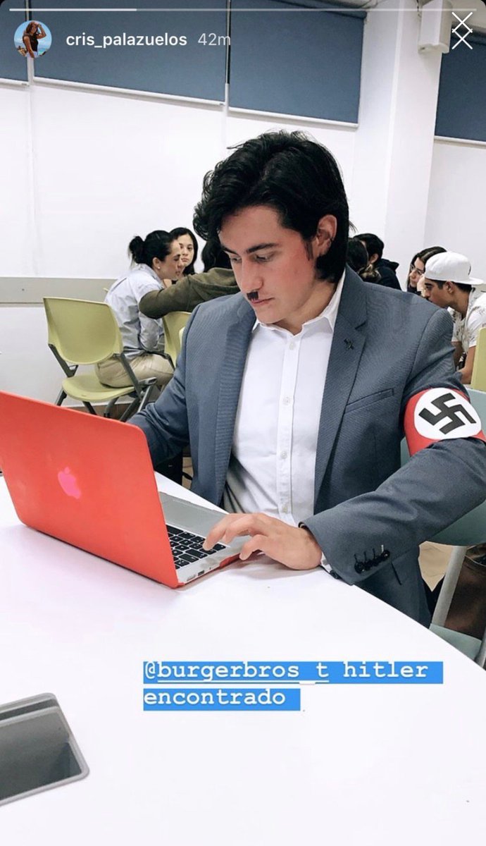 StopAntisemites's tweet photo. As part of a class marketing assigning at a University in Mexico City, a student dressed up as #Hitler in order to sell the most burgers. He ended up winning, posing with a very please instructor.

We have no words for this one. https://t.co/FBE1SZHeWR