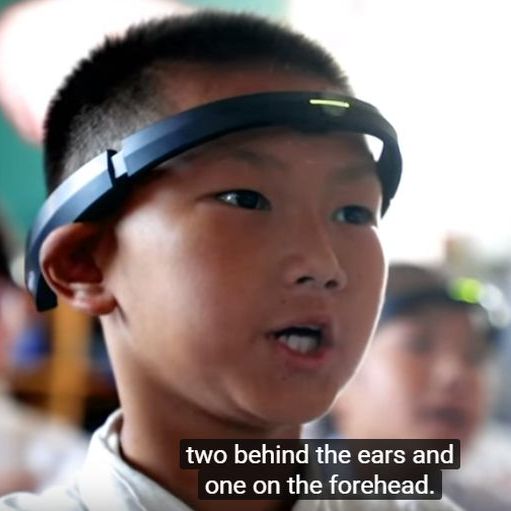 child with device on his head to monitor attention