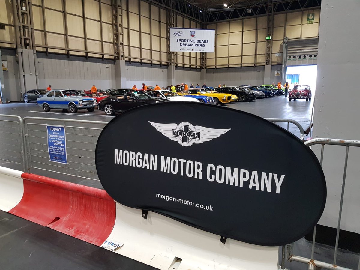 morganmotor's tweet photo. We are supporting the Sporting Bears Dream Rides at the NEC Classic Car show this weekend. Fancy a ride in the new Plus Six? Head to hall 5 to book, all money goes to charity! #NEC #ClassiCarShow #SportingBears https://t.co/RQrVxvXlIF