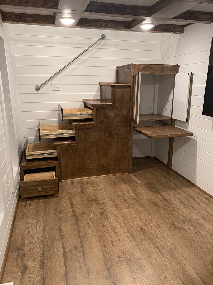 altinyhomes's tweet photo. Check out all the storage space in the staircase that leads up to the master (king sized) loft in our Trinity!  Staircase up the back wall is the signature to our Trinity model tiny home. #tinyhomebuilders #tinyhouseonwheels #storagespacefordays #tinyhousestaircase https://t.co/1XsqGqpmea