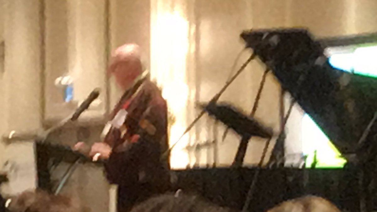 JasonWJamieson's tweet photo. OMEA’s living historian Dr. Rodger Beatty presenting the #OPUS100 day 1 keynote reflection on 100 years of the Ontario Music Educator’s Association #omea https://t.co/hsnalV0lVO