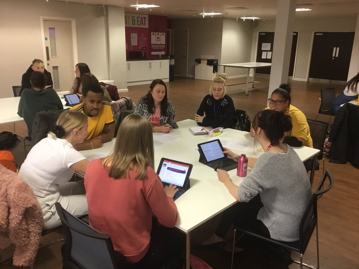 Occupational Therapy and Dental students deep in thought discussing ‘The Learning Disability Mortality Review’ #Interprofessionallearning