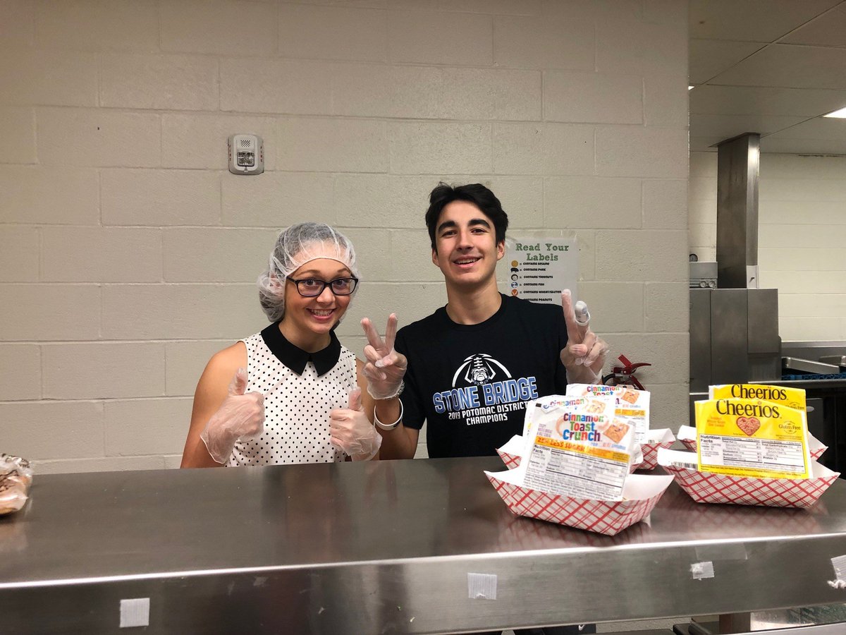 LCPSCafe's tweet photo. Students at @StoneBridgeLCPS encouraging their peers to fuel up with a nutritious #LCPSBreakfast! https://t.co/vN4Xx1l5dk