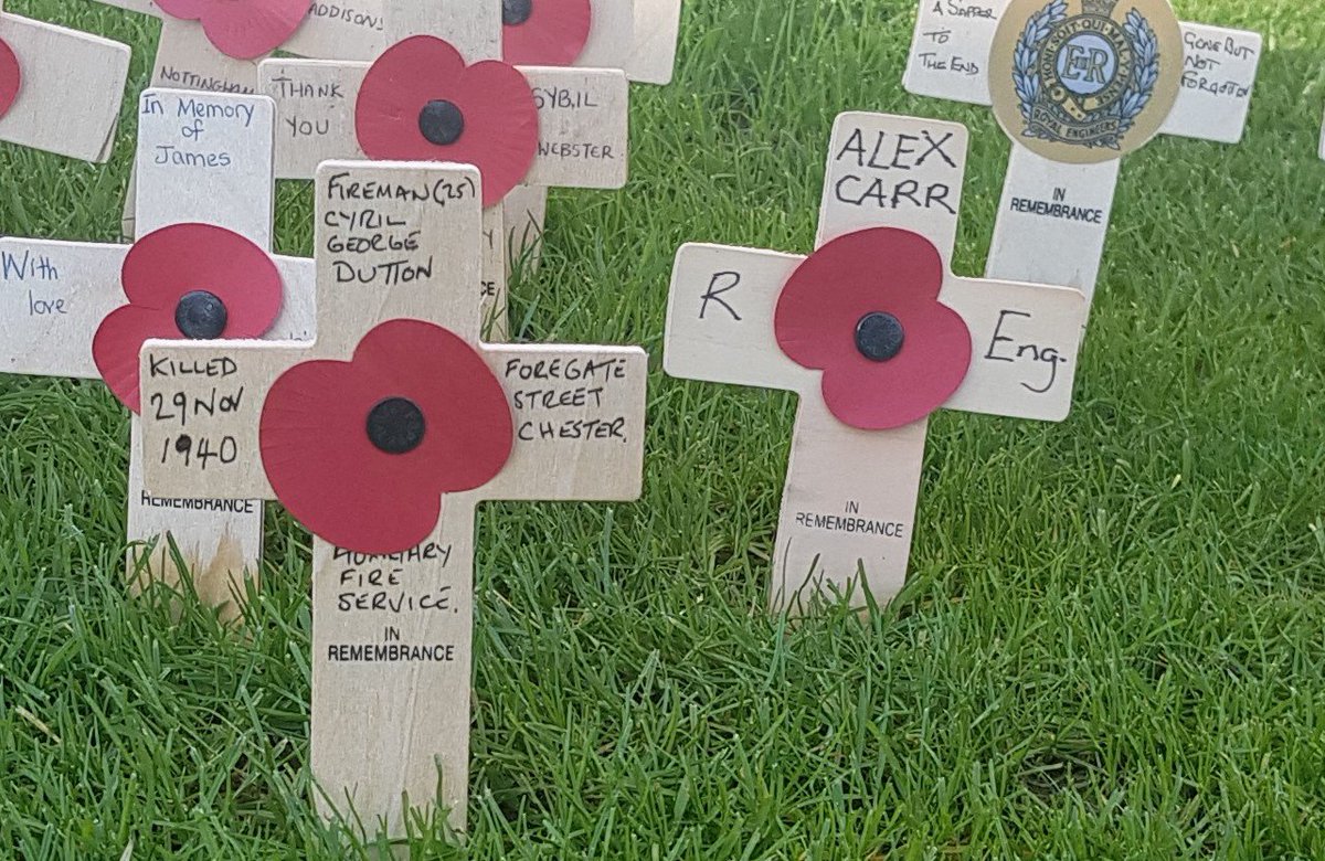 ChesterFireStn's tweet photo. Firefighters from Green &amp; Red Watch's,  laid a Poppy Cross in the Garden of Remembrance to Remember Fireman Cyril George Dutton.   He was killed on duty 29th Nov 1940  in Foregate Street Chester fighting the Blitz.  Later a Poppy Wreath was laid at his Grave.  Lest we Forget https://t.co/rHeGXQQUae