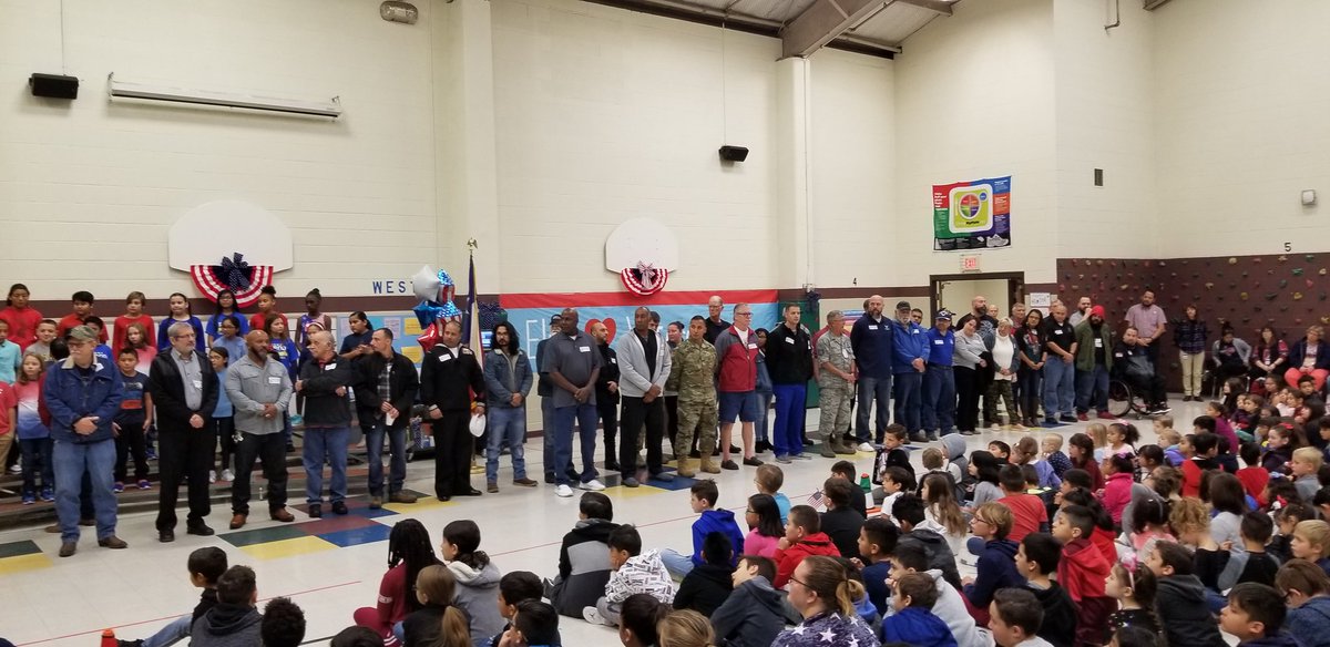 NISDElrod's tweet photo. Freedom Rings True for the Red, White, and Blue! Elrod proudly honored the service of our military Heros! Thank you @nisd_saltamez and Elrod's Choir for the great performances! And special thanks to @jmarshallrotc Color Guard for presenting the flags.  
@NISD
#VeteransDay https://t.co/KgyANiV3qo