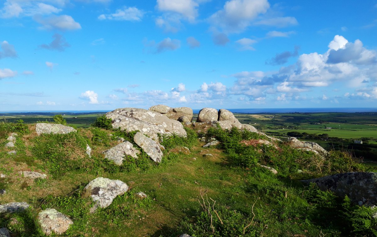 Chapel Carn Brea Long Cairn is a natural granite outcrop that was extended by 11m by our Neolithic ancestors. Panoramic views to The Scillies one way, The Lizard in the other. Long cairns quite rare in these parts. It catches the evening sun beautifully. #PrehistoryOfPenwith