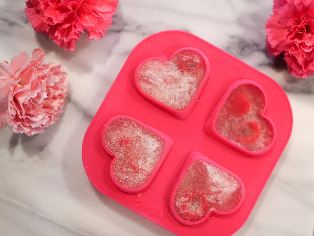 Making champagne + raspberry ice cubes on the blog! How fun are these <a href="/TovoloUS/">Tovolo</a> silicon molds? bit.ly/2loCtrC