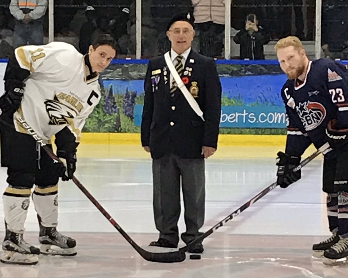sjjuniorhockey's tweet image. Branch 32 member Gus French stood at centre ice with captains Mark Ryan of CBN and Tyler Anthony of NE to drop the opening puck