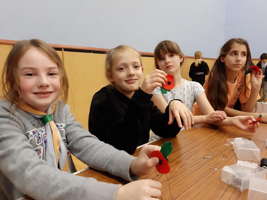 Making poppies at the Cubs sleepover ready for Remembrance parade tomorrow. #cubs #scouting #poppy #RemembranceDay