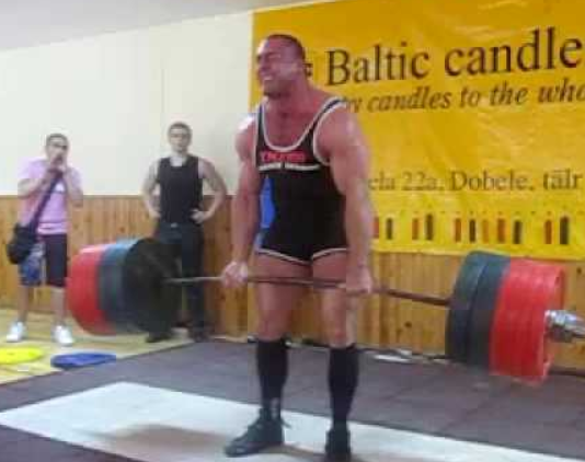Conventional deadlifts are where you stand behind the bar, feet at a more or less normal width, and grab the bar with your hands outside your feet and legs. A good example of a conventional deadlifter is Konstantin Konstantinovs.