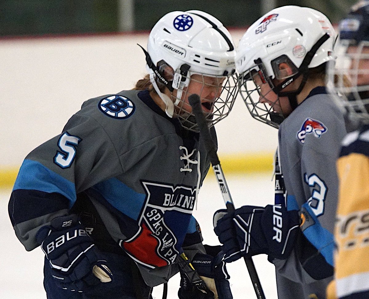 Danglefest 10A 

Best celebration so far goes to Blaine/Spring Lake Park's duo of Sammy Kelnzenberg (#5) and Olive Huegel (#23). 

Double hand-slaps (left), complete by smashing foreheads together (right).