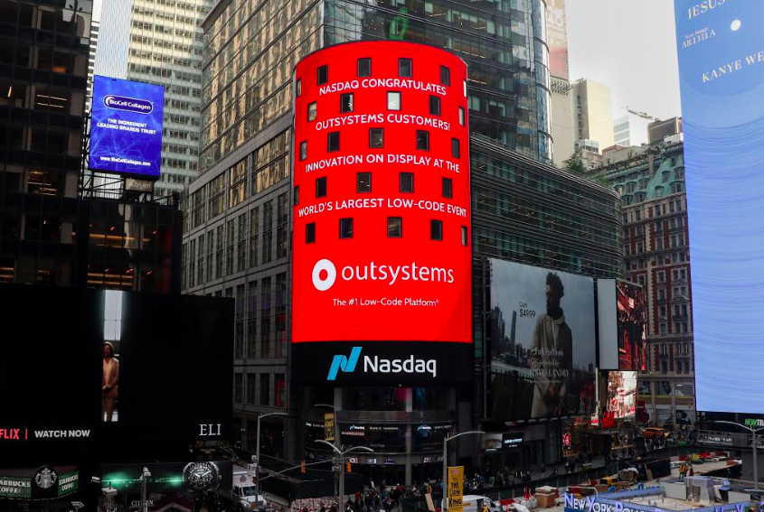 OutSystems's tweet photo. From Times Square to Amsterdam, everyone is talking about the amazing customer innovation on display at the largest #lowcode event - even @Nasdaq! #nxStep https://t.co/FBTVGO8PRJ