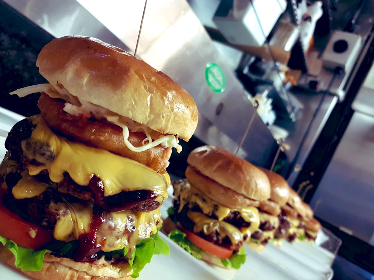 Nope, not a mirror! 12 of our XO burgers going out to a seriously hungry table in Southgate last night! #eatlocal #Southgate #Enfield #GourmetBurgers