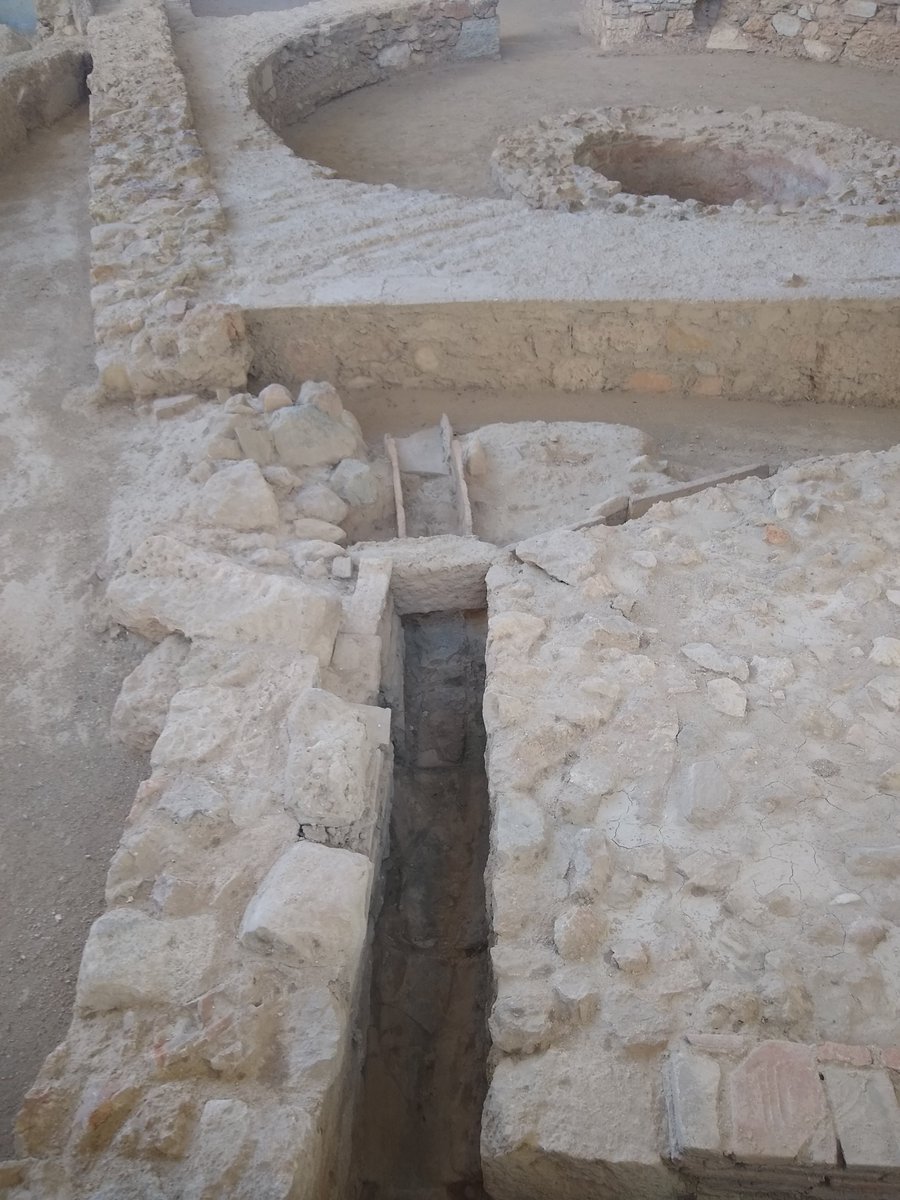 The superstructure respected the substructure, with walls carefully built around these humble drains, allowing waste to flow from the homes/14