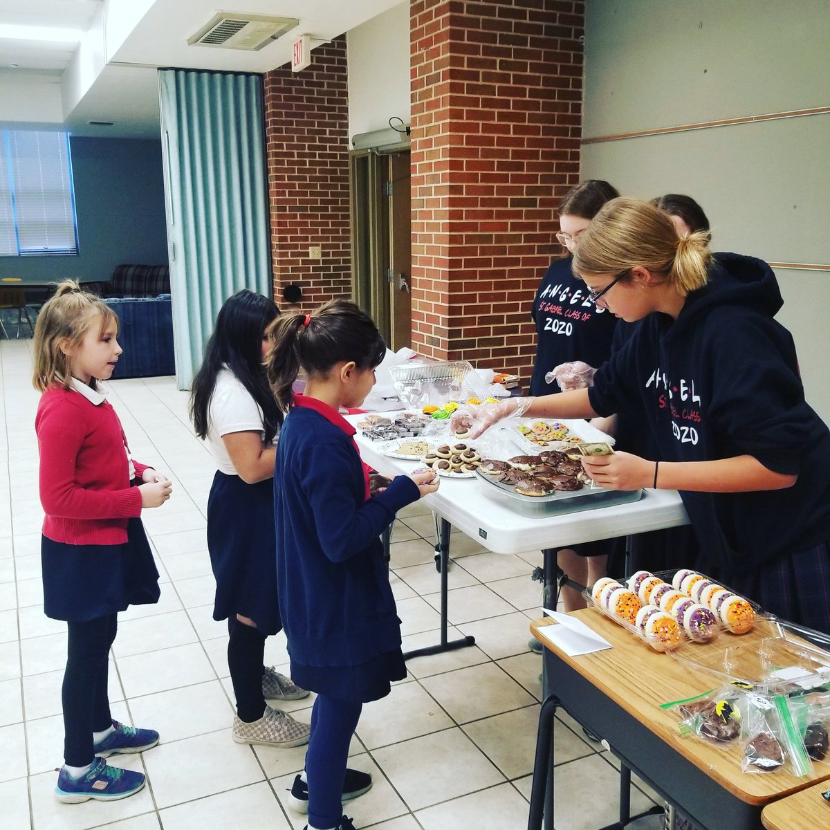 MrsAmyElizabeth's tweet photo. Auction and Halloween Week 2019! Our #studentleaders are having a bake sale today and tomorrow! #StGabrielShines #teachingsforlife #CatholicStudentLeaders @StGabrielKC https://t.co/pRKIN6wlyw
