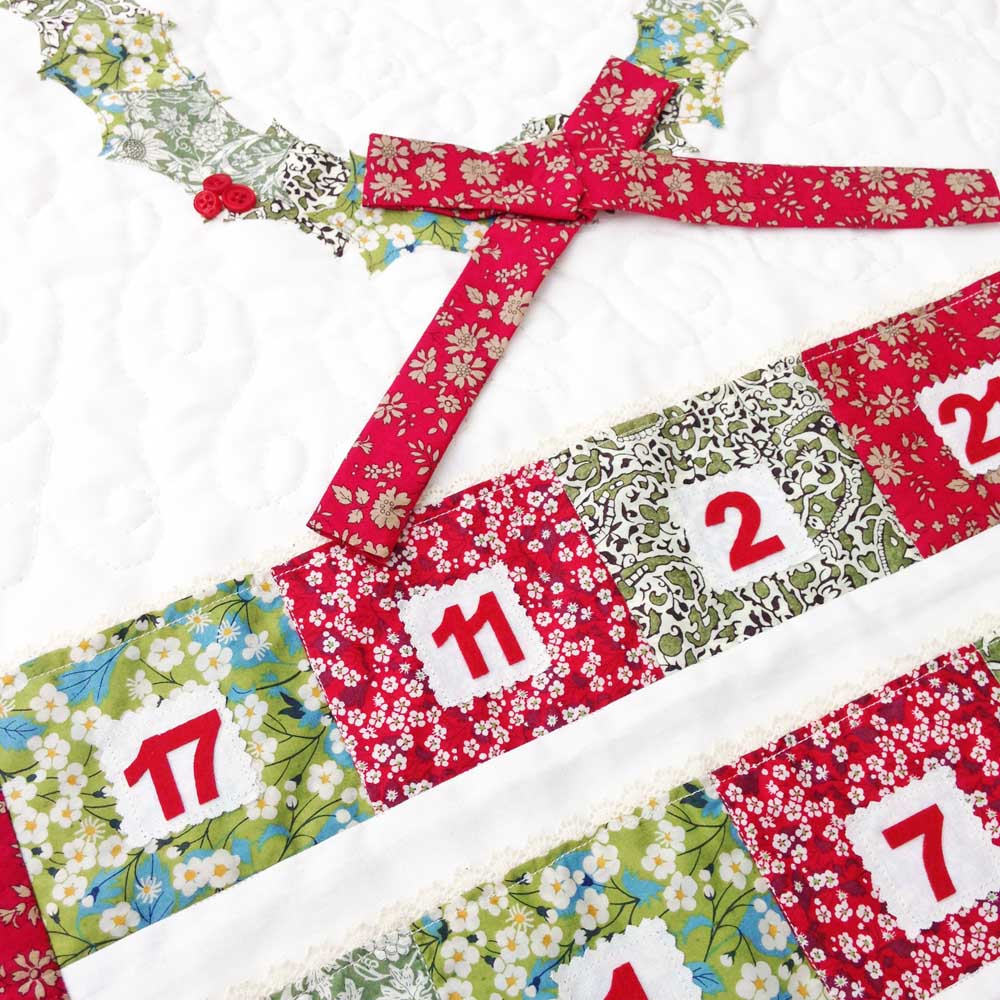 We love the <a href="/tiedwitharibbon/">Isabella Wild</a> advent calendar using our Liberty fabrics.  We are selling the kit now so that you can make an heirloom calendar to use for years to come #Christmas #adventcalendar #Libertyfabric