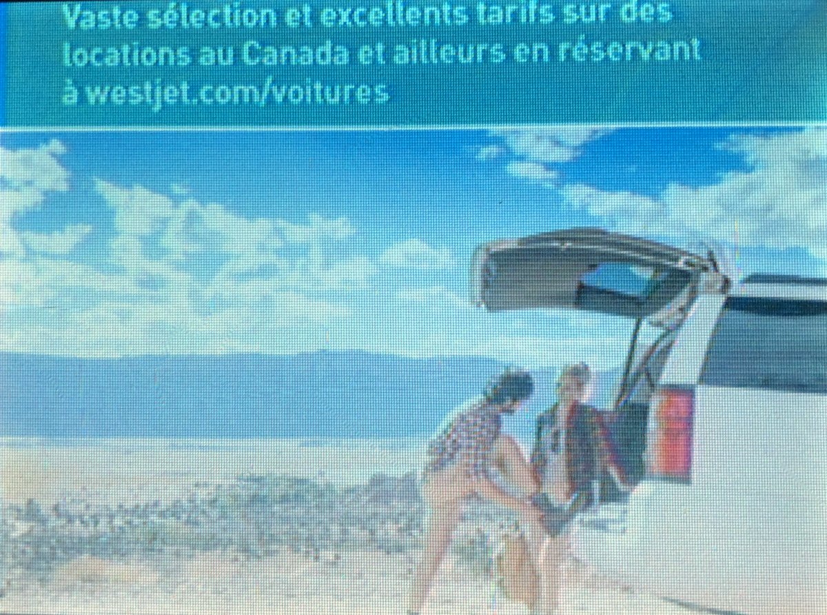 ilancooley's tweet photo. @westjet I’ve asked around and I swear we think it looks like this guy in your on-board screen ad isn’t wearing pants. Thanks for the chuckle! https://t.co/Lv78DSFvAD