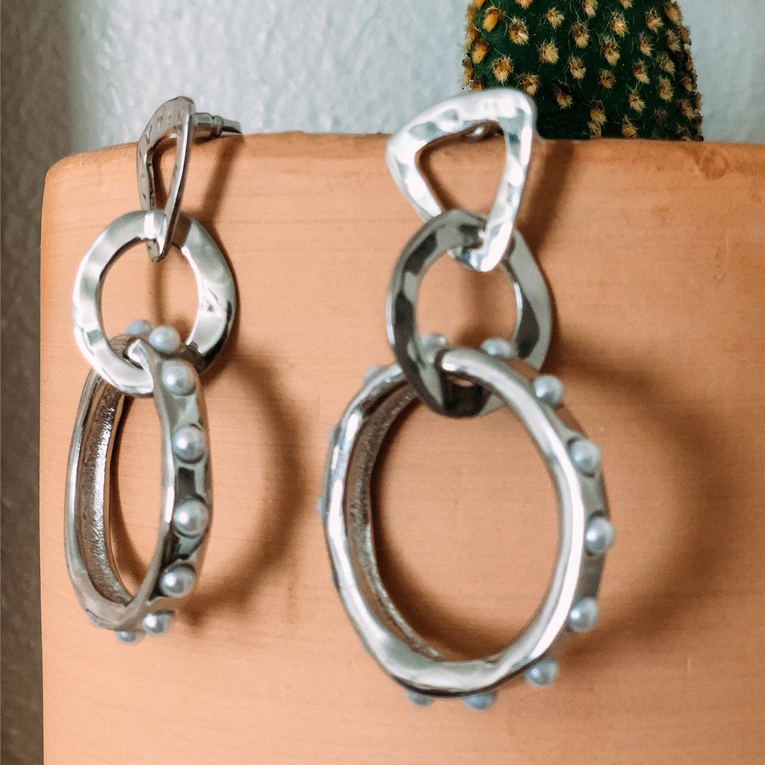 The2Bandits's tweet photo. Introducing the Sonny and Cher earrings 💃✨🕺 #the2bandits https://t.co/LOCkG2BnTG