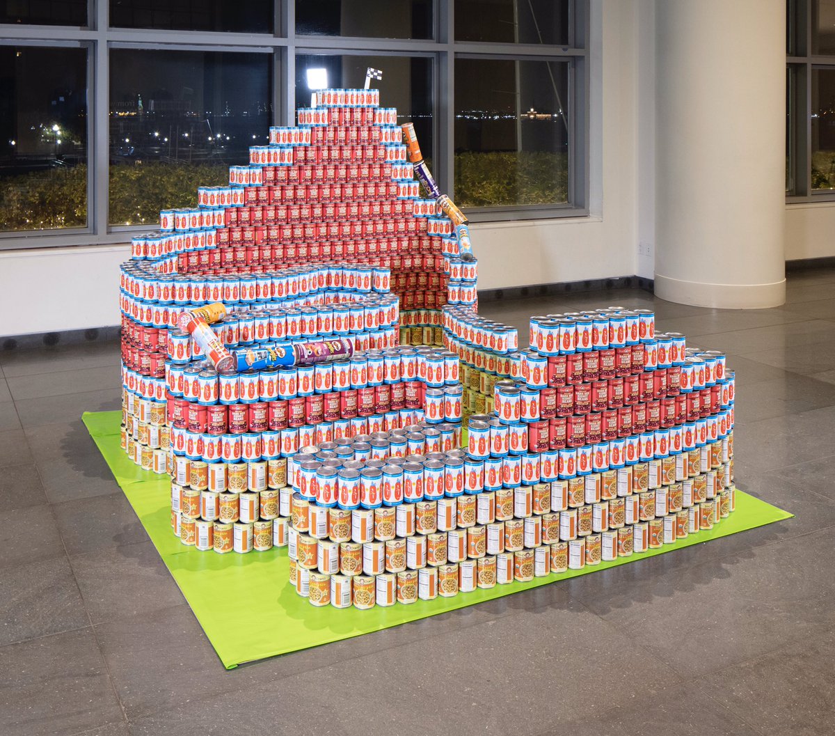 canstructionny's tweet photo. @LanganEngEnv #canstructed "Please Keep Your CANS and Feet Inside the Ride" in 2018. See what they build this year at @BFPLny 230 Vesey Street Nov 7-21. #cantribute a 🥫 or 🥫🥫 to @CityHarvest when you visit! #rollercoaster #canart #engineers #architects https://t.co/BO9WYxR3UB