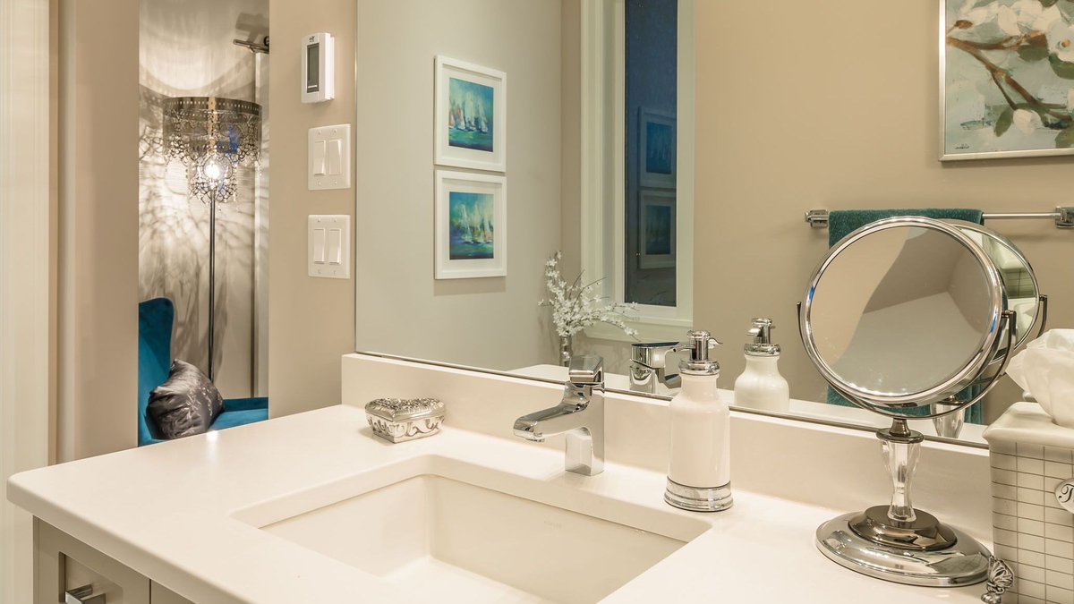 The Oak Crest bathroom has a “Light &amp; Bright” concept with the use of natural light from the windows and finishings of grey and white. It also has a stand-alone bathtub with chrome accents.   

#AlairHomesNanaimo  #KitchenAndBathMonth #designinspo #Bathrooms