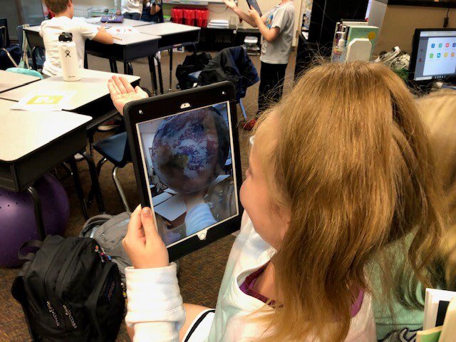 OconeeCoSchools's tweet photo. Fourth graders at @HighShoals_Hawk had a blast wrapping up their Earth and Space Unit with 3D exploration! #mrsdailey #augmentedreality 🌌📱 https://t.co/2bNXCsA7ak