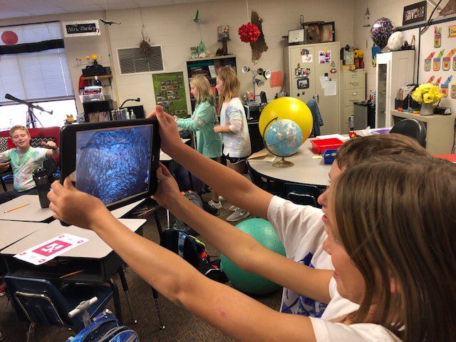 OconeeCoSchools's tweet photo. Fourth graders at @HighShoals_Hawk had a blast wrapping up their Earth and Space Unit with 3D exploration! #mrsdailey #augmentedreality 🌌📱 https://t.co/2bNXCsA7ak