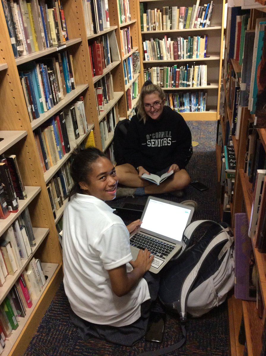 DJOLibrary's tweet photo. Senior knights Genevieve and Eleanor reading good books @DJOLibrary on Catholic Christian Living in the Koons #librarystacks at #Dewey 248.482 for #MrRoseDJO https://t.co/RaOw79zxPg
