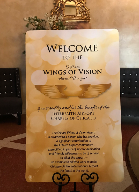 fly2midway's tweet photo. Chicago Department of Aviation (CDA) Commissioner Jamie L. Rhee was honored at the 23rd Annual #WingsofVision awards banquet, hosted by the Interfaith Airport Chapels. She received the Executive Service award which honors airport community members. Congrats! https://t.co/OMUVCLZUk6