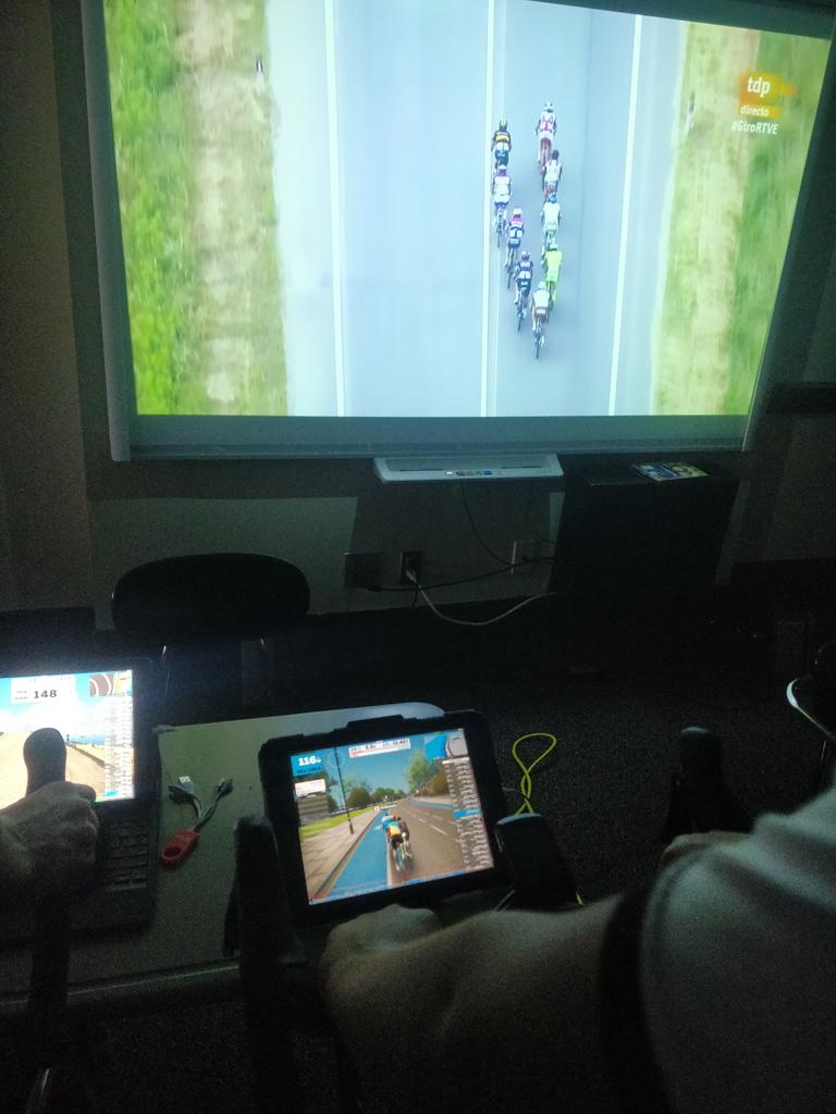 Cold &amp; rainy outside so we ride inside the virtual world of <a href="/GoZwift/">Zwift</a> on our <a href="/wahoofitness/">Wahoo</a> kickrs from @RichBikeMart while listening to Euro techno &amp; watching an old stage of the Giro de Italia. Convergence of Real &amp; E-sports.