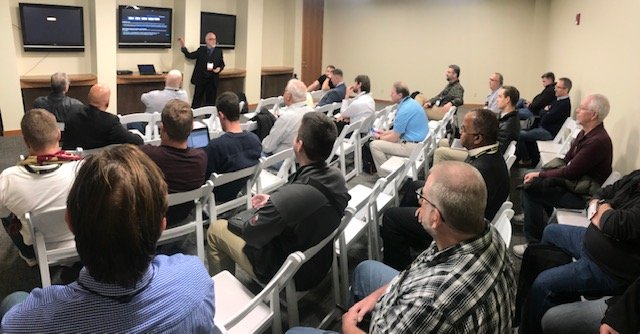 SecureWorld's tweet photo. John Callaghan in the @Denver_ISACA chapter meeting at SecureWorld Denver, presenting "Threat Intelligence: The Humans, the SIEMs, and the Analytics." #SWDEN19 https://t.co/C89tjdWSRr