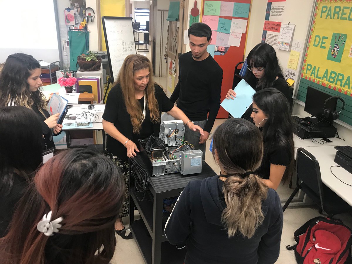 TeamPhoenixALL's tweet photo. Dr. Wheaton and her students dissecting a computer... putting the Technology in CCTA! @cctaphoenixes #iamepisd #cctaphoenixes https://t.co/ctuNaalpYn