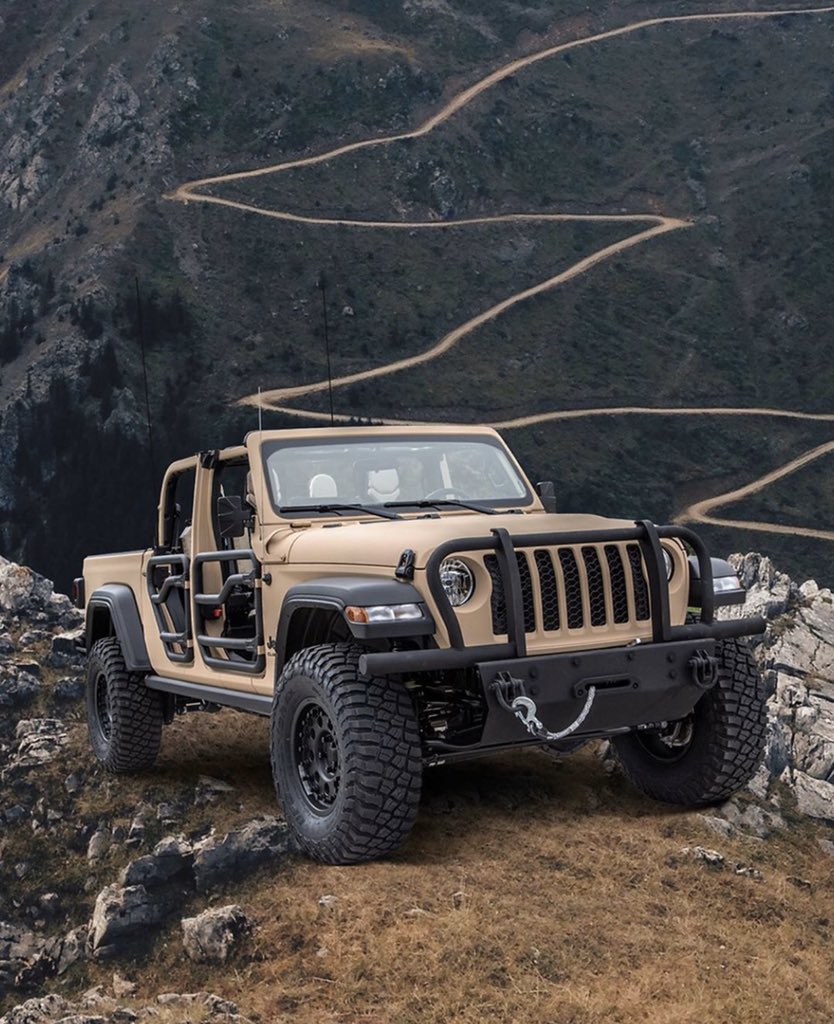 GearToGear's tweet photo. Windy roads are not for the weak 🏔AM General will partner with Jeep to produce a military grade Gladiator.  
🏴🏁🏴
📸 @caranddriver
#Jeep #Gladiator #JeepGladiator
#GladiatorXMT #GEAR2GEAR https://t.co/Qd0nJpprLJ