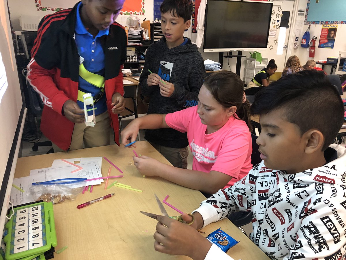 EsopakisMaria's tweet photo. I love watching 5th graders construct their Ferris wheel! @PBCSTEM https://t.co/2fYLj4fsKU