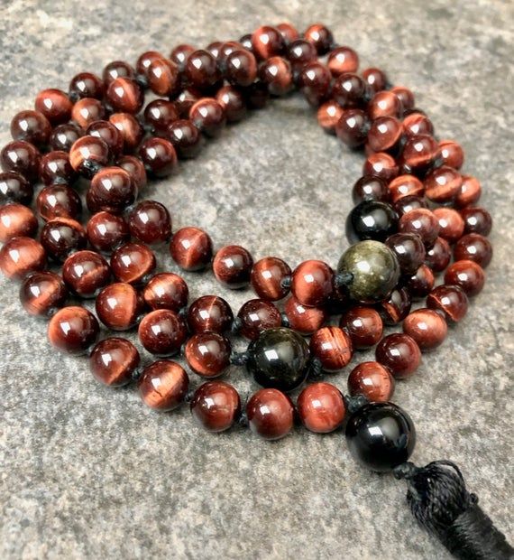GaiaGemsLLC's tweet photo. This 108 Mala Gemstone Necklace combines the power of Red Tiger Eye and Golden Sheen Obsidian. To find out more about each gemstone and to order this Mala visit https://t.co/quqWHnwIv7 📿 🌏 🙏 #108Mala #tigerseye #redtigereye #obsidian #gemstonenecklace #gaiagems #etsy #etsyshop https://t.co/wtaoAIFjEr