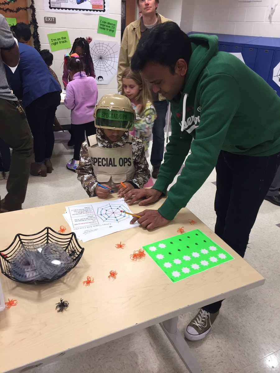 MrsReider1's tweet photo. Fun night with families engaged in math at our Spooctacular #mathnight @LyonsMill @BaltCoPS @BCPSMATH https://t.co/yAyg3snIis