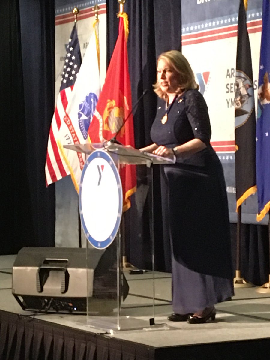 asymca's tweet photo. Honoring the first of two Angels of Honor at the 13th annual Angels of the Battlefield Gala: Bonnie Carroll of @TAPSorg. “Together we will stand strong... We will be there for those that need us.” #angels19 https://t.co/j41HJ5y9CO
