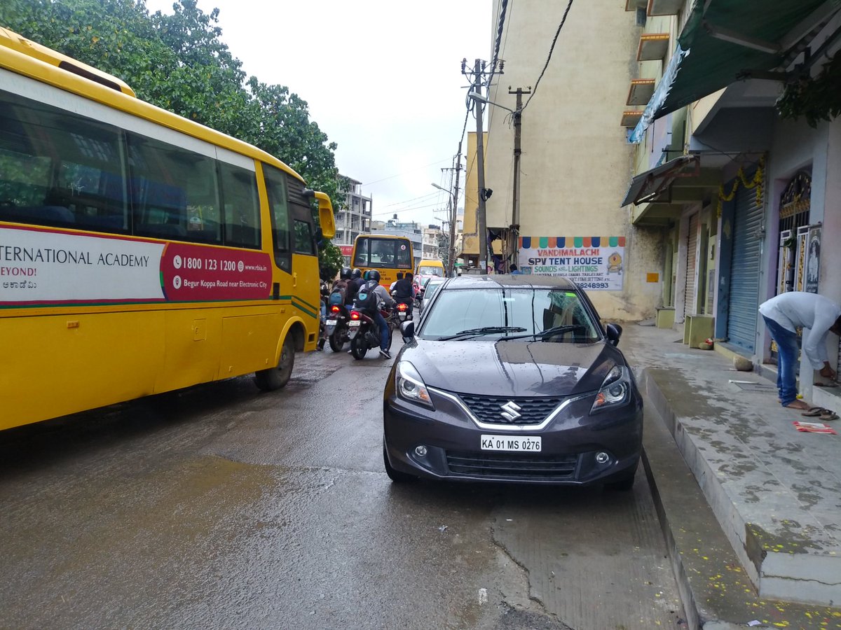 velu1122's tweet photo. Today, in Mangammanapalya road (near canara bank ATM) at 7 45am, a car parked on road caused a big choke in that narrow road. People should have common sense before they park... https://t.co/QxLAY08Qi7