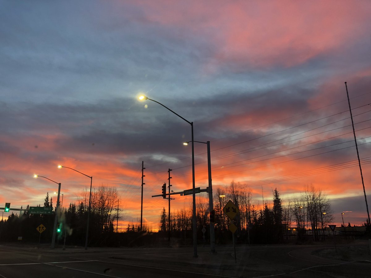 edabney's tweet photo. This morning’s view. #sunrise Also, we have no snow and that’s not normal. #ClimateChangeIsReal #KeepAlaskaCold @FBXClimate https://t.co/mW99pKMNMj