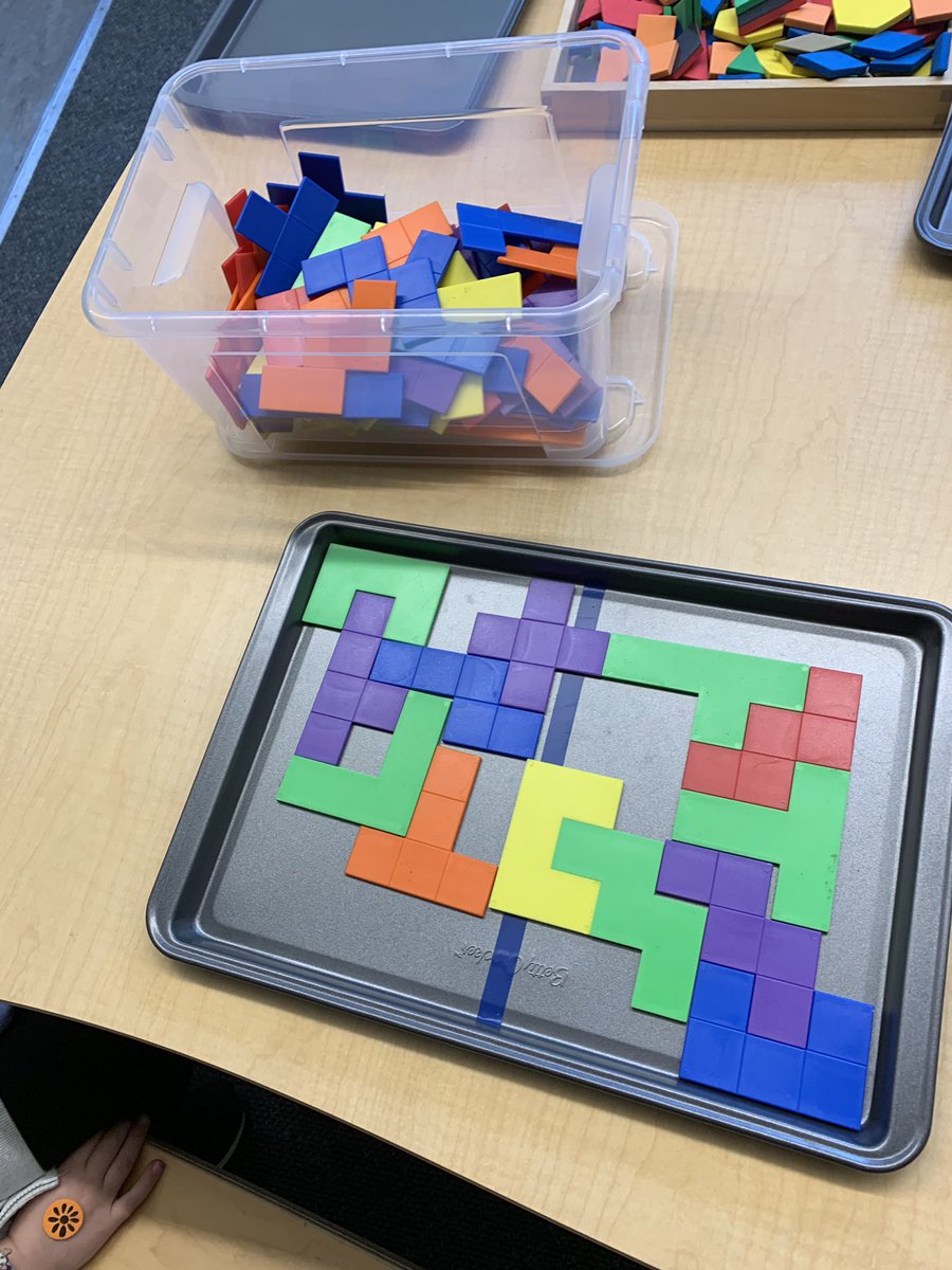 hartley_lori's tweet image. Persistence in kindergarten @CaulfeildSchool can look like trying to fill the tray using pentaminoes. #spatialawareness
