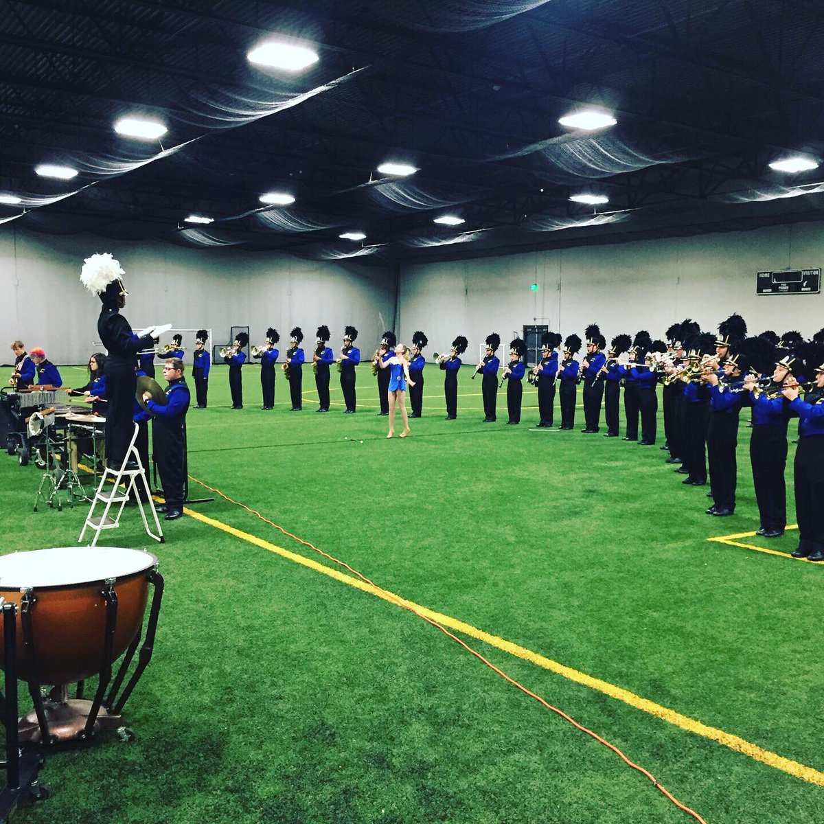 collegiateband's tweet photo. The @wcsks Marching Spartans performed INSIDE today at the Southern Plains Marching Festival, earning Superior 1 Ratings from all judges AND an Outstanding Drumline award.
#🔥
#GladThatWasInside
#ProbaTeDignum
#BandFam https://t.co/Rui3avDfVM