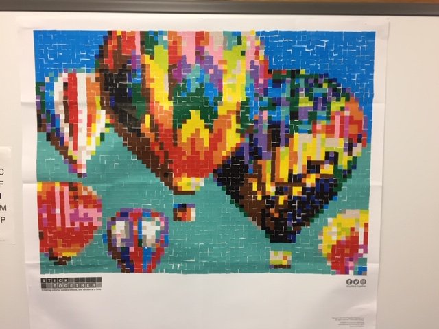 Fabulous mosaic art created in JFK's library during Teen Read Week!!